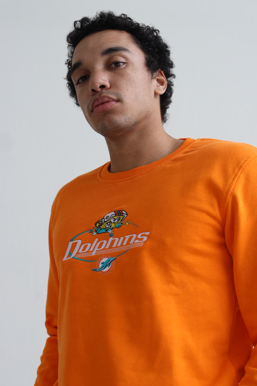 Pull ras du cou brodé NFL x Nickelodeon - Miami Dolphins