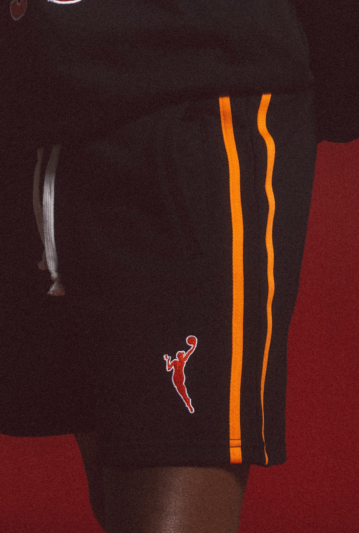 WNBA Striped Fleece Shorts - Black / Fire Orange
