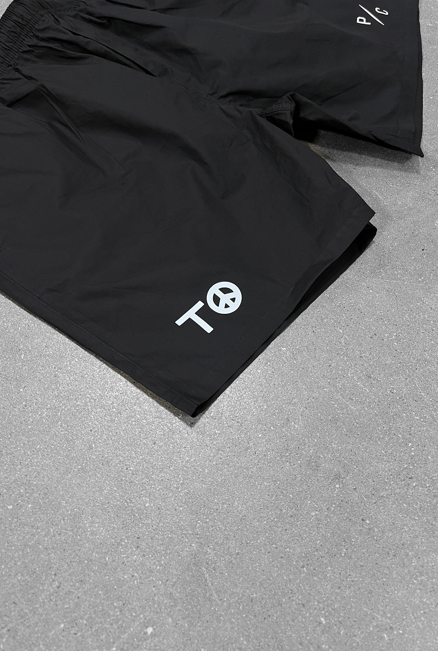 "TO" Peace Sign Board Shorts - Black