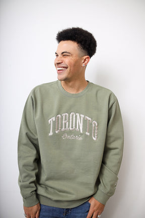 Col ras du cou teint par pigments Toronto Tourist - Vert sauge