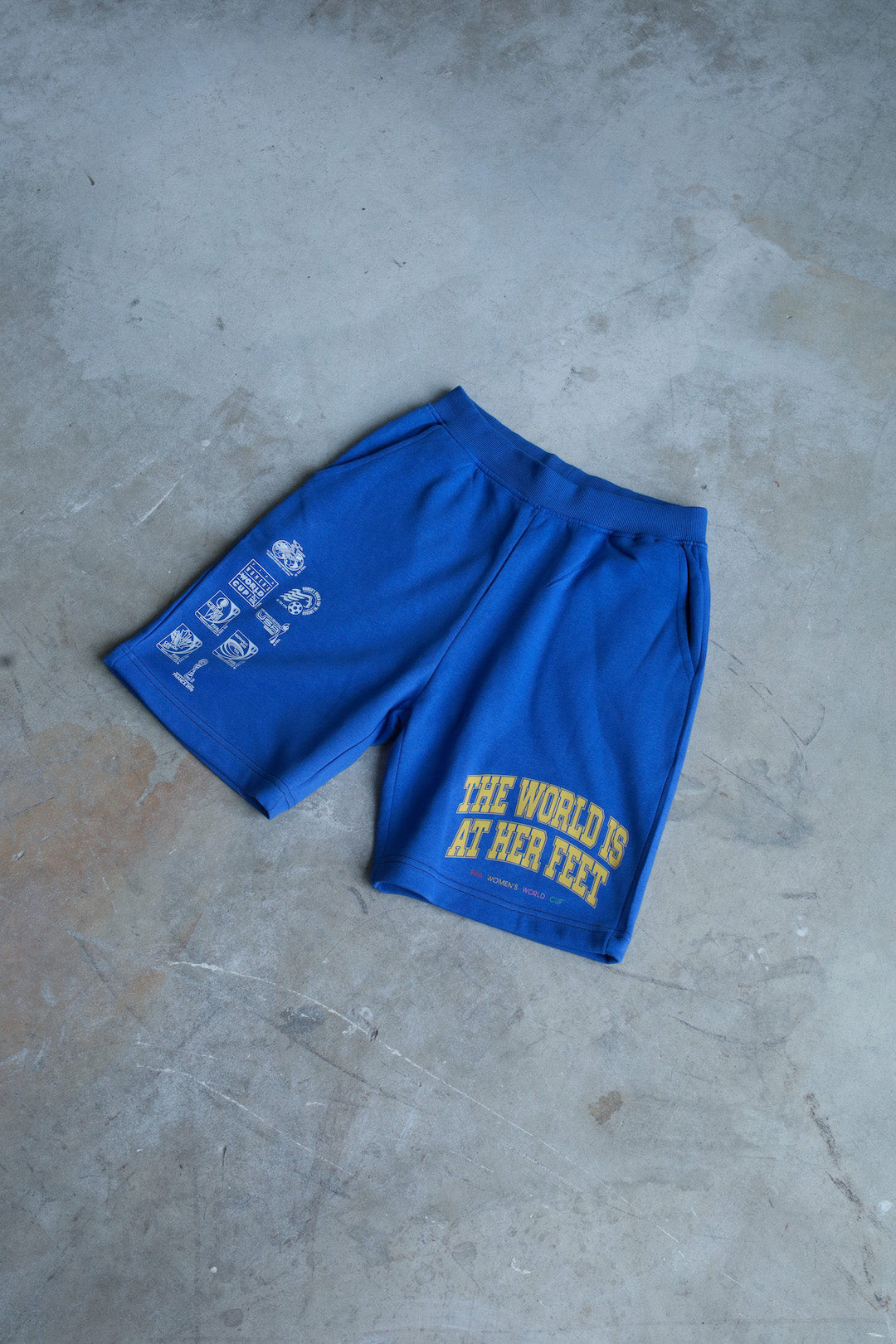 The World is at Her Feet Fleece Shorts - Royal