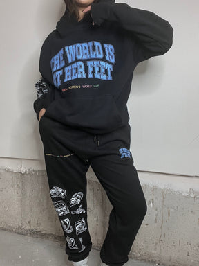 The World is at Her Feet Heavyweight Hoodie - Black